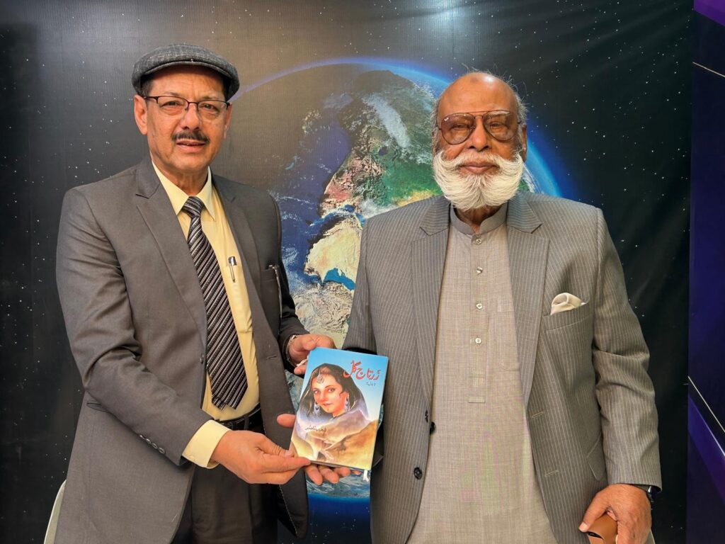 Shoaib Nasir Presenting His Novel "Zartaj Gull" To Ex MNA Mr Kanwer Qutub Uddin Khan.