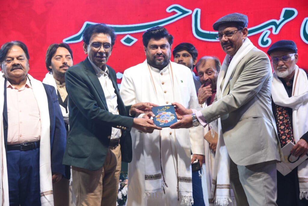 Shoaib Nasir presenting His Traveloge "Safar e Khush Gzrey" to Governor Sindh Mr Kamran Tesoori & Federal Minister Dr Khalid Maqbool Siddiqui.